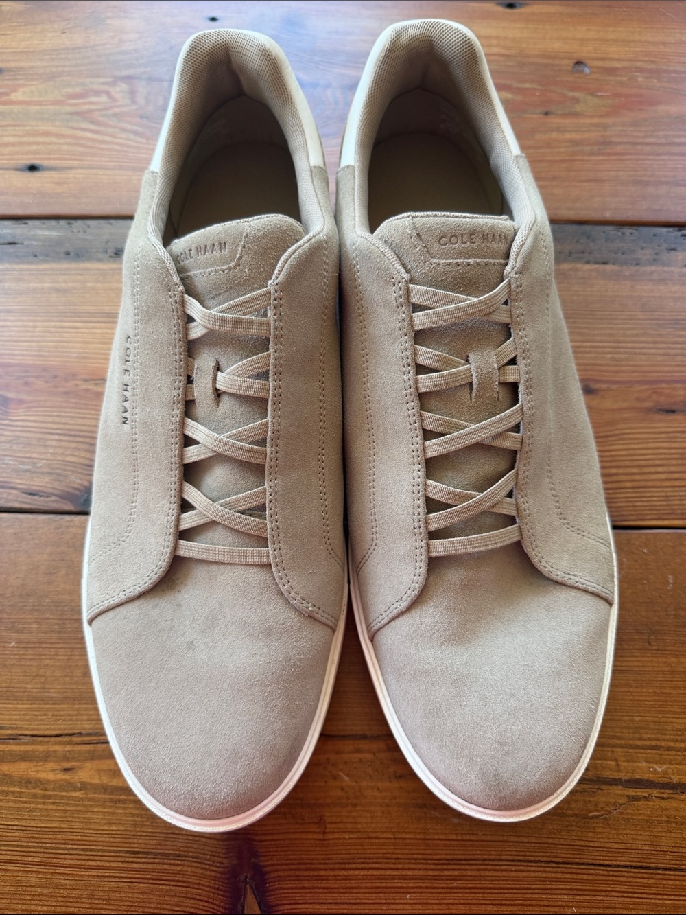 Cole Haan GrandPro Luxe Suede slip-on sneakers.